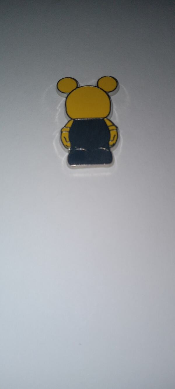 Disney Vinylmation Jr yellow and black mickey pin.